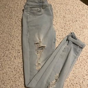 Ripped High Rise Skinny Jeans